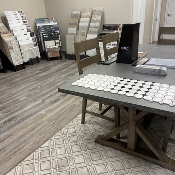 Ooltewah Flooring Gallery - a table with a laptop on it - Flooring Near Me - Ooltewah, Tennessee Ooltewah Flooring Gallery - a table with a laptop on it - Flooring Near Me - Ooltewah, Tennessee