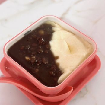 Kowloon Tong - a bowl of mashed potatoes and sauce - Desserts Near Me - Brooklyn, New York