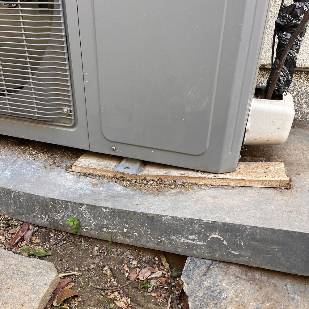 Highland Air - Unstable foundation on uneven ground, using scraps of wood. Plastic platform was bending & the whole unit would rock w/the slightest touch. - Heating & Air Conditioning/HVAC Near Me - Oak Park, California Highland Air - Unstable foundation on uneven ground, using scraps of wood. Plastic platform was bending & the whole unit would rock w/the slightest touch. - Heating & Air Conditioning/HVAC Near Me - Oak Park, California
