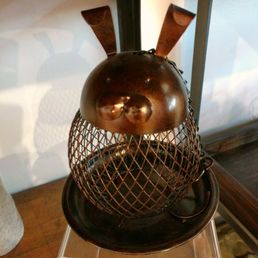 Copper bunny bird feeder in the gift shop