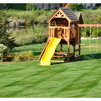 Ground Effects - a wooden swing set with a yellow slide - Irrigation Near Me Ground Effects - a wooden swing set with a yellow slide - Irrigation Near Me