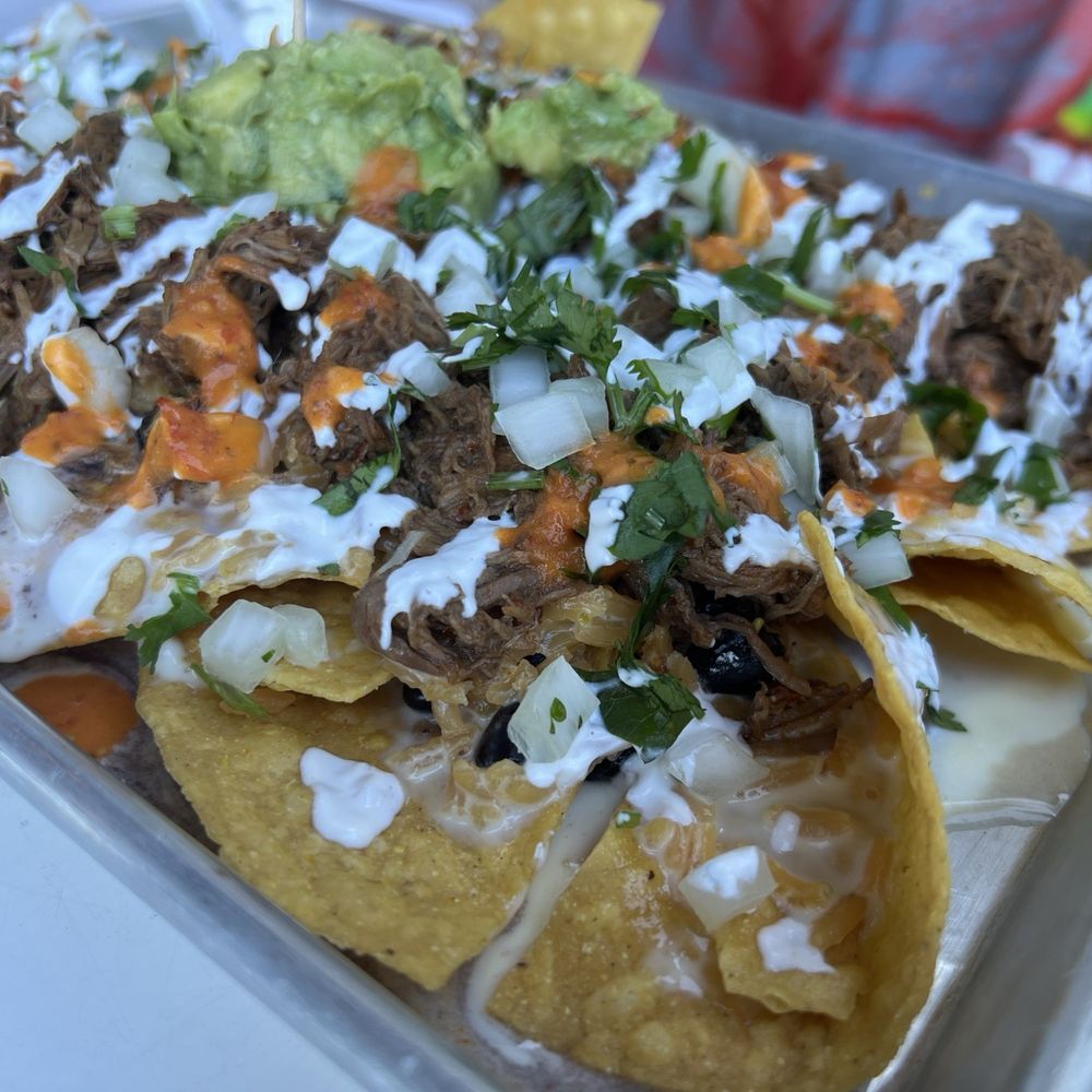 Tikila Tacos & Mezcal - Birria Nachos - Mexican Near Me - Wake Forest, North Carolina Tikila Tacos & Mezcal - Birria Nachos - Mexican Near Me - Wake Forest, North Carolina