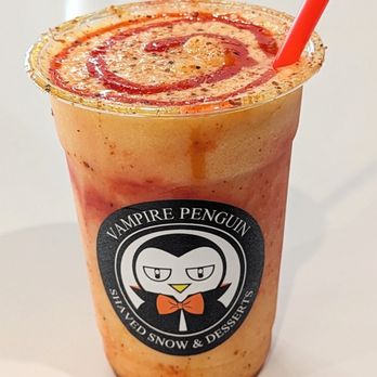 Vampire Penguin - Mexican Candy Smoothie!
Mango snow, chamoy, caramel & tajin. - Ice Cream & Frozen Yogurt Near Me - Palm Beach Gardens, Florida Vampire Penguin - Mexican Candy Smoothie!
Mango snow, chamoy, caramel & tajin. - Ice Cream & Frozen Yogurt Near Me - Palm Beach Gardens, Florida