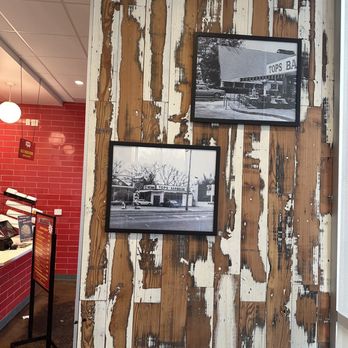 Tops Bar-B-Q - ows a picture of a restaurant with peeling paint on the walls - Barbeque Near Me - Bartlett, Tennessee