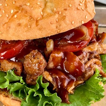 Caramba Street Food - a sandwich with meat and lettuce - Burgers Near Me - Katy, Texas
