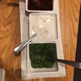 Flavors - Canandaigua - Chutneys-$1.99 Tamarind (brown) Onion (white) Mint (green) - Indian Near Me - Canandaigua, New York Flavors - Canandaigua - Chutneys-$1.99 Tamarind (brown) Onion (white) Mint (green) - Indian Near Me - Canandaigua, New York