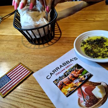 Carrabba's Italian Grill - Hot Bread, Olive Oil and Herbs starts every meal - Italian Near Me - Southgate, Michigan Carrabba's Italian Grill - Hot Bread, Olive Oil and Herbs starts every meal - Italian Near Me - Southgate, Michigan
