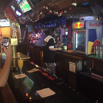 The Store - a man sitting at a bar - Bars Near Me - Chicago, Illinois The Store - a man sitting at a bar - Bars Near Me - Chicago, Illinois