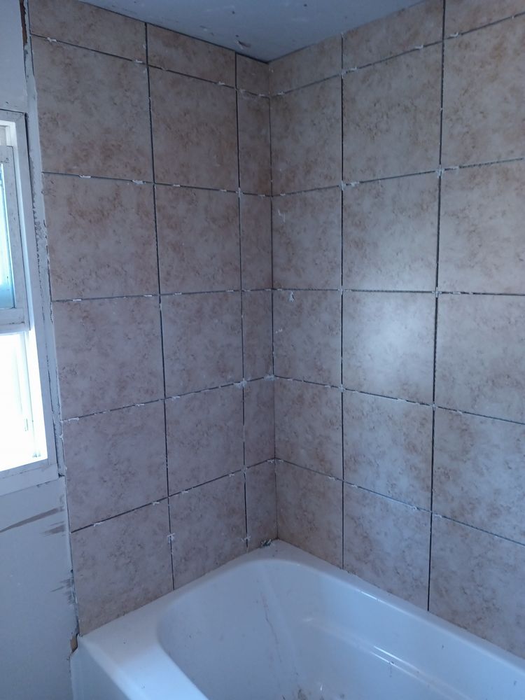 Slide of J AND G ROOFING