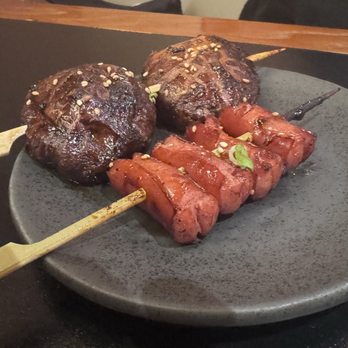 Nomu Izakaya - The skewers my wife ordered: Mushrooms and Sausages. - Japanese Near Me - Jacksonville, Florida Nomu Izakaya - The skewers my wife ordered: Mushrooms and Sausages. - Japanese Near Me - Jacksonville, Florida