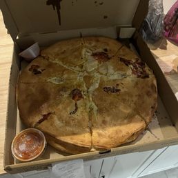 Stuffed john's pizza well done and l cannot believe how wonderful it is!! If you come to Key west and don't order from John's ???