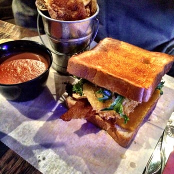 The Yard - Fried green tomato grilled cheese with a side of tomato soup - New American Near Me - Pittsburgh, Pennsylvania The Yard - Fried green tomato grilled cheese with a side of tomato soup - New American Near Me - Pittsburgh, Pennsylvania