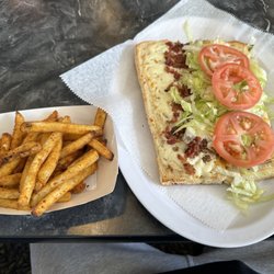 Bellacino's Pizza & Grinders - Chicken bacon ranch grinder with Cajun fries