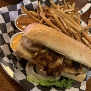 Bridges Waterside Grille - Cajun Grilled Fish Sandwich - American Near Me - Michigan City, Indiana Bridges Waterside Grille - Cajun Grilled Fish Sandwich - American Near Me - Michigan City, Indiana