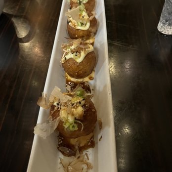 Go Sushi - Deep-fried octopus rice ball with scallions, crispy onions, bonito flakes with house sauce! Super amazing! - Sushi Bars Near Me - Flagstaff, Arizona Go Sushi - Deep-fried octopus rice ball with scallions, crispy onions, bonito flakes with house sauce! Super amazing! - Sushi Bars Near Me - Flagstaff, Arizona