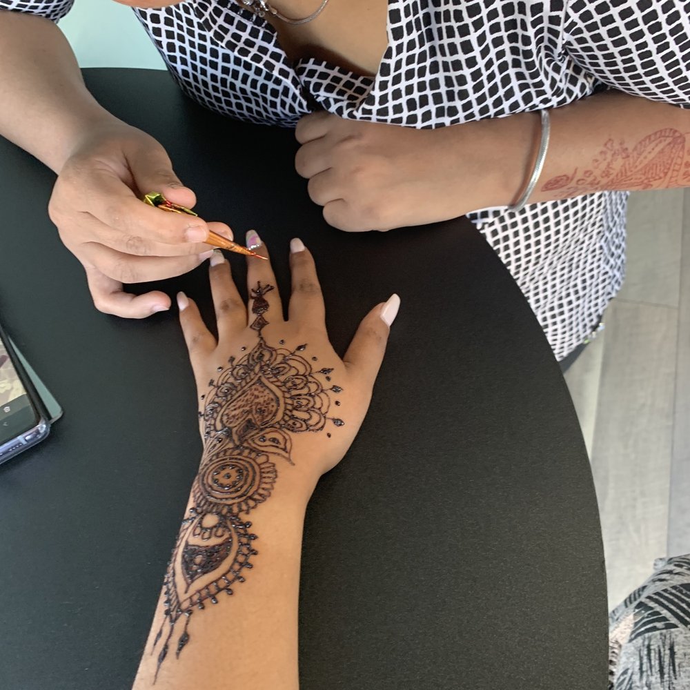 Henna getting done.