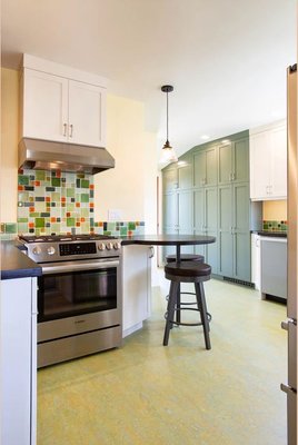 Photo of Greenhome Solutions - Seattle, WA, US. PaperStone countertops and Marmoleum flooring - kitchen by Mighty House Construction