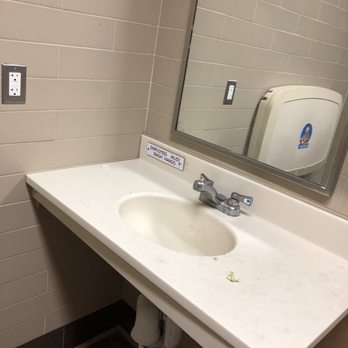 Tim Hortons - Zoom into the countertops an you will be able to see the filth, too bad you can't see how dirty the mirror is. - Cafes Near Me - Novi, Michigan