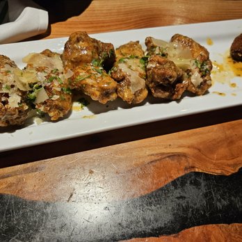 Forum Social House - garlic parmesan wings - Bars Near Me - Bellevue, Washington