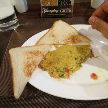 EggMania - Masala omelette - too much turmeric, took very long to bring out (45 minutes) - Indian Near Me - Iselin, New Jersey