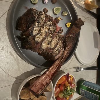 Tia Carmen - Tomahawk steak, with bone marrow butter, absolutely insane and delicious with their loco de gallo, so fresh with a lovely dressing - Breakfast & Brunch Near Me - Indian Wells, California Tia Carmen - Tomahawk steak, with bone marrow butter, absolutely insane and delicious with their loco de gallo, so fresh with a lovely dressing - Breakfast & Brunch Near Me - Indian Wells, California