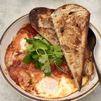 Sunday - Shakshuka, bread, sourdough - Breakfast & Brunch Near Me - St Augustine, Florida Sunday - Shakshuka, bread, sourdough - Breakfast & Brunch Near Me - St Augustine, Florida