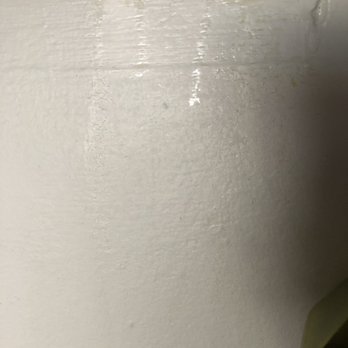 university village - Oil/grease that seeped through the kitchen walls whenever the kitchen was warm - Apartments Near Me - Columbus, Ohio