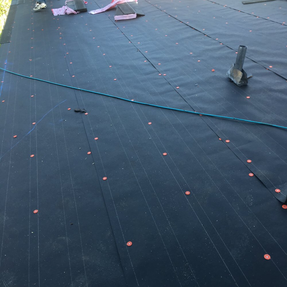 Slide of Mercedes Roofing