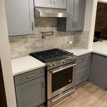 Sean Malt Construction - a kitchen with a stove and cabinets - Landscaping Near Me - Portland, Oregon Sean Malt Construction - a kitchen with a stove and cabinets - Landscaping Near Me - Portland, Oregon