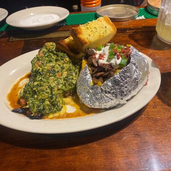 Mariner's Inn - Popeye grilled chicken with spicy spinach cheese sauce - Steakhouses Near Me - Hammond, Louisiana