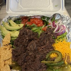 The Flame Tacos - This taco salad with Barbacoa is pretty amazing and for a great price!