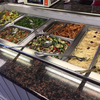 Falafel 54 - Delicious lunch buffet. Those fried pita strips were awesome with the hummus - Buffets Near Me - Durham, North Carolina