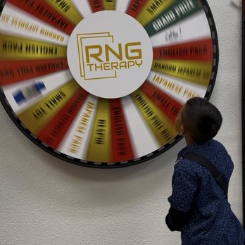 RNG Therapy Card Lounge - My son spinning the wheel - Hobby Shops Near Me - San Jose, California