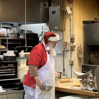 Michael's Gourmet Catering - santa preparing food - Caterers Near Me - Toledo, Ohio
