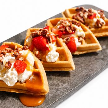 Pure Love Cafe - Dulce de leche Waffles:
mexican caramel, pecans, strawberries chantilly cream, honey - Coffee & Tea Near Me - Tucson, Arizona Pure Love Cafe - Dulce de leche Waffles:
mexican caramel, pecans, strawberries chantilly cream, honey - Coffee & Tea Near Me - Tucson, Arizona