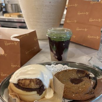 Hani's Bakery - This is the cinnamon roll, the cookie, the chocolate chip cookie, and the blueberry Matcha drink - Bakeries Near Me - New York, New York Hani's Bakery - This is the cinnamon roll, the cookie, the chocolate chip cookie, and the blueberry Matcha drink - Bakeries Near Me - New York, New York