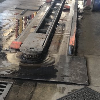 Beverly Car Wash - Broken conveyor belt (look at the right side where the orange wheel is laying low). - Car Wash Near Me - Montebello, California