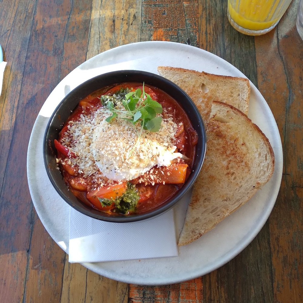 Jerry Joy - Hot pot! Chorizo, cherry tomatoes, butter beans, poached egg = yum! - Coffee & Tea Near Me - Thornbury, VIC