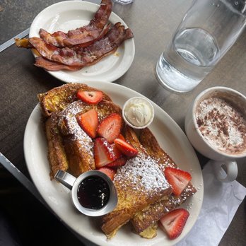 Millie's Cafe - French Toast w/ Strawberries on top and bacon on the side - Breakfast & Brunch Near Me - Los Angeles, California Millie's Cafe - French Toast w/ Strawberries on top and bacon on the side - Breakfast & Brunch Near Me - Los Angeles, California