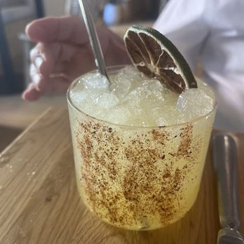 Leche De Tigre - The happy hour appetizers and mezcal margarita - Peruvian Near Me - San Antonio, Texas Leche De Tigre - The happy hour appetizers and mezcal margarita - Peruvian Near Me - San Antonio, Texas