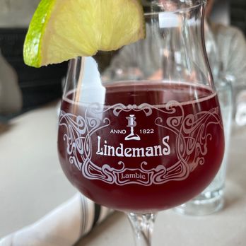 Jack Sprat - a glass of wine with a lime wedge - New American Near Me - Girdwood, Alaska