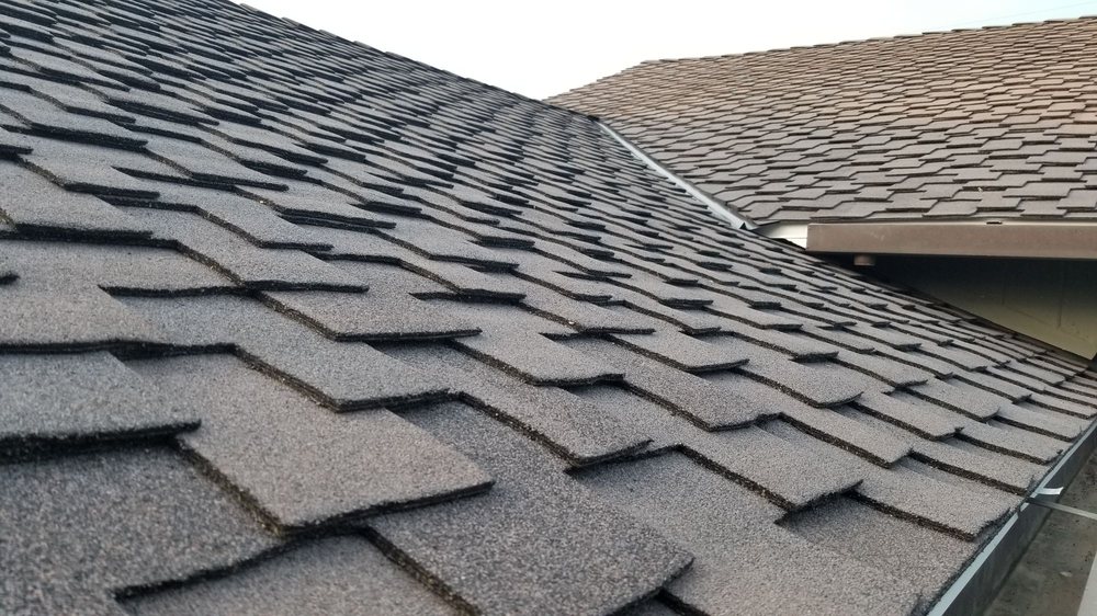 Slide of EC Roofing