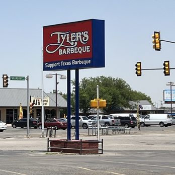 Tyler's Barbeque - a large sign in a parking lot - Barbeque Near Me - Amarillo, Texas Tyler's Barbeque - a large sign in a parking lot - Barbeque Near Me - Amarillo, Texas