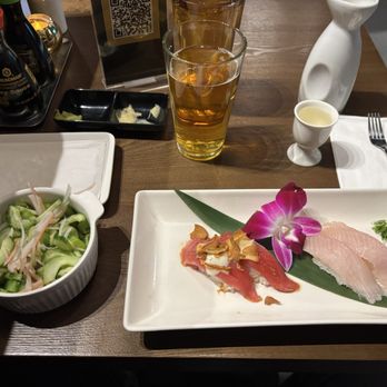 Kai Sushi - Cucumber sunomono salad, triple garlic tuna nigiri and yellowtail nigiri. - Sushi Bars Near Me - Henderson, Nevada Kai Sushi - Cucumber sunomono salad, triple garlic tuna nigiri and yellowtail nigiri. - Sushi Bars Near Me - Henderson, Nevada