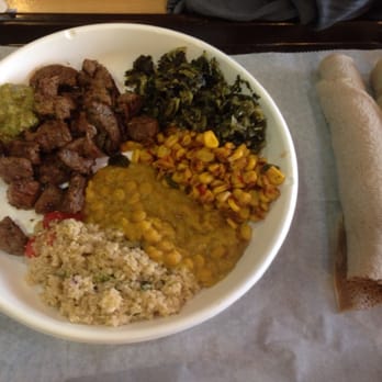 Nazrawi Ethiopian Restaurant - When I come here I like to get the grilled lamb with injera corn, lentils and collard greens this meal is very satisfying. - Ethiopian Near Me - Silver Spring, Maryland Nazrawi Ethiopian Restaurant - When I come here I like to get the grilled lamb with injera corn, lentils and collard greens this meal is very satisfying. - Ethiopian Near Me - Silver Spring, Maryland