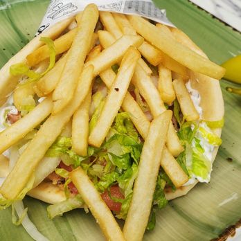 Art's Bakery & Cafe - Fries on the inside of the chicken gyro. - Bakeries Near Me - Glendale, California Art's Bakery & Cafe - Fries on the inside of the chicken gyro. - Bakeries Near Me - Glendale, California