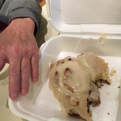 GG's Place - Delicious cinnamon roll! Couldn't wait to take a bite before taking the photo!