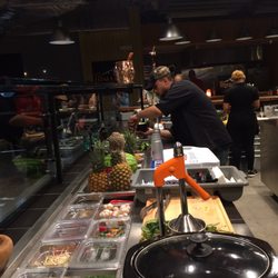 The Noodle Merchant - Chef preparing Pho.