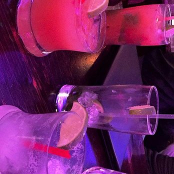 Travesias - Guava - ginger martini on the left and passion-coconut on the right - Latin American Near Me - Bronx, New York Travesias - Guava - ginger martini on the left and passion-coconut on the right - Latin American Near Me - Bronx, New York