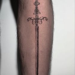 De La Luz - Genuine Tattoo - sword done by Evan